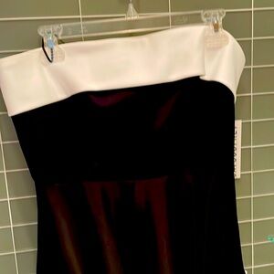 Perfect for New Year’s Eve. Strapless tuxedo style dress.